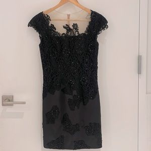 Little black dress with lace design and intricate beadwork